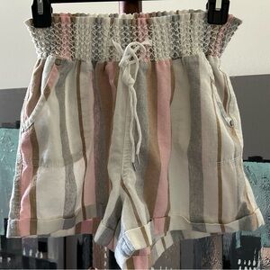 Women’s paper bag high-waisted shorts.